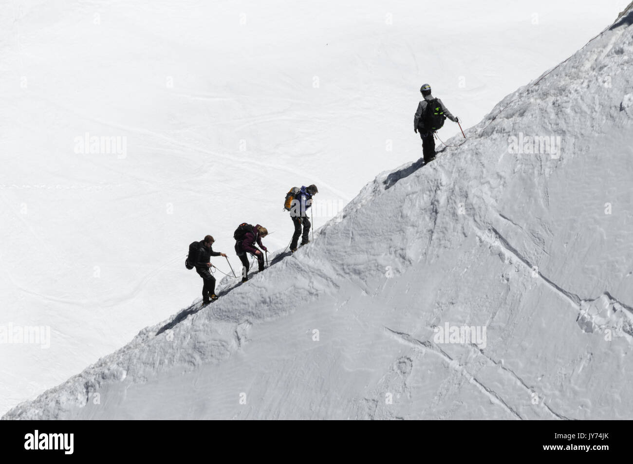 Kletterer aufsteigend Aguille Du Midi, Frankreich. Stockfoto