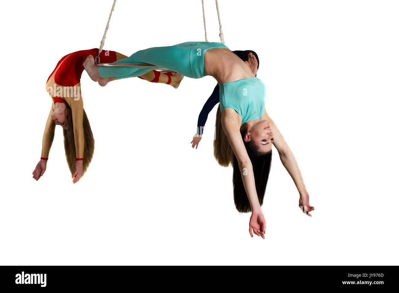 Die junge Frau Trio tun som akrobatische Tricks auf Antenne Glanz Stockfoto