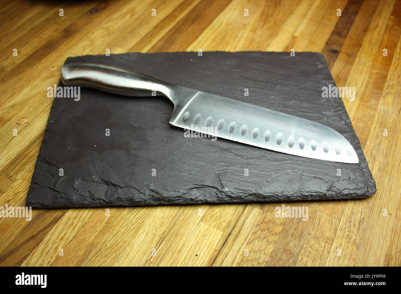 Scharfes Messer von Schiefer board Stockfoto