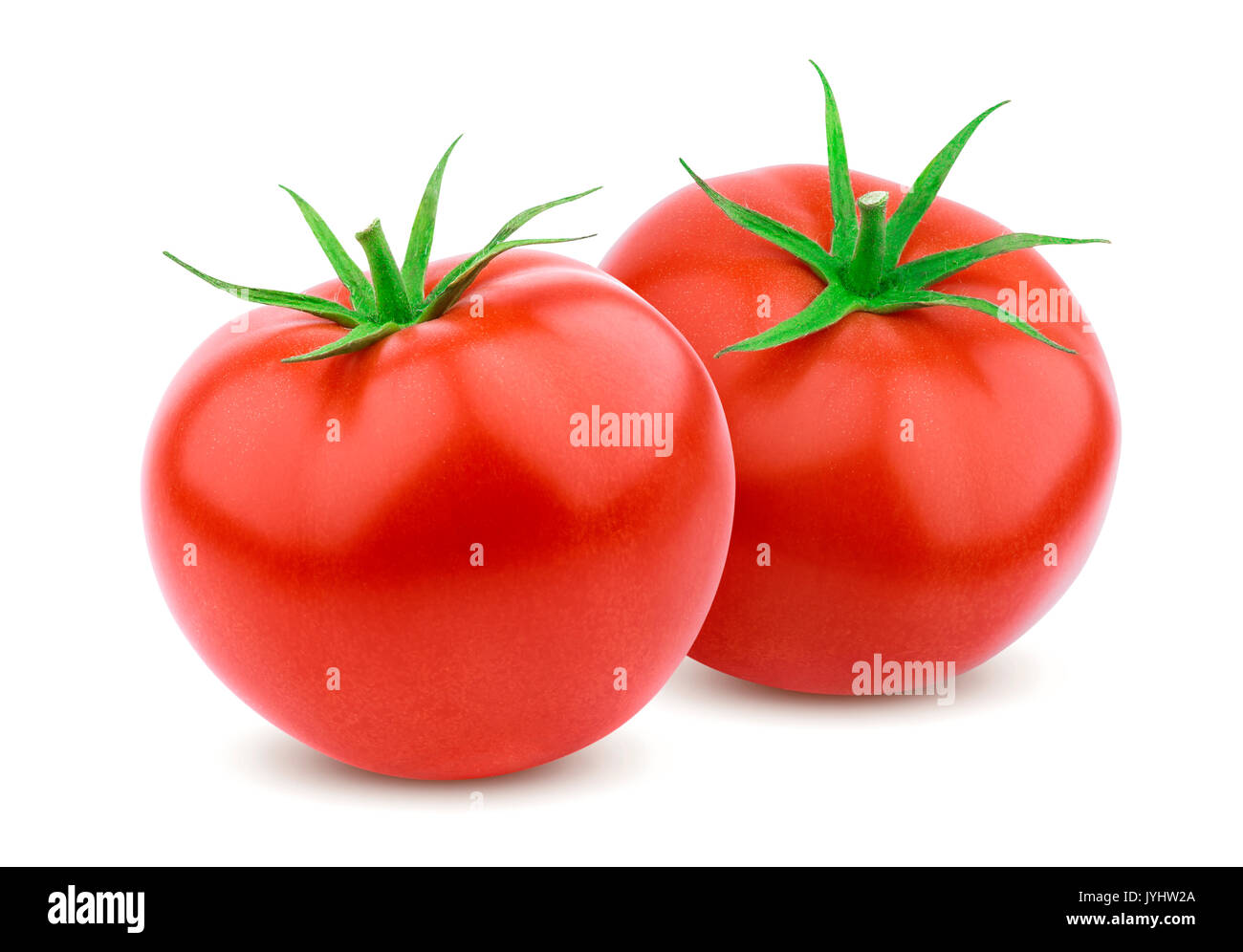 Zwei ganze Tomaten auf weißem Hintergrund Stockfoto