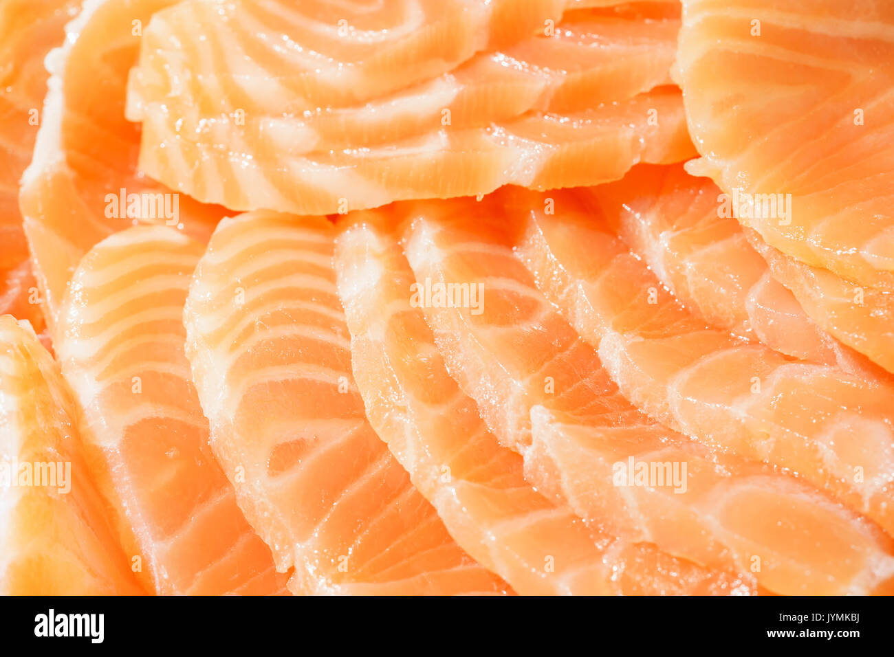Hintergrund auf Scheiben Lachssteak roten Fisch. Stockfoto
