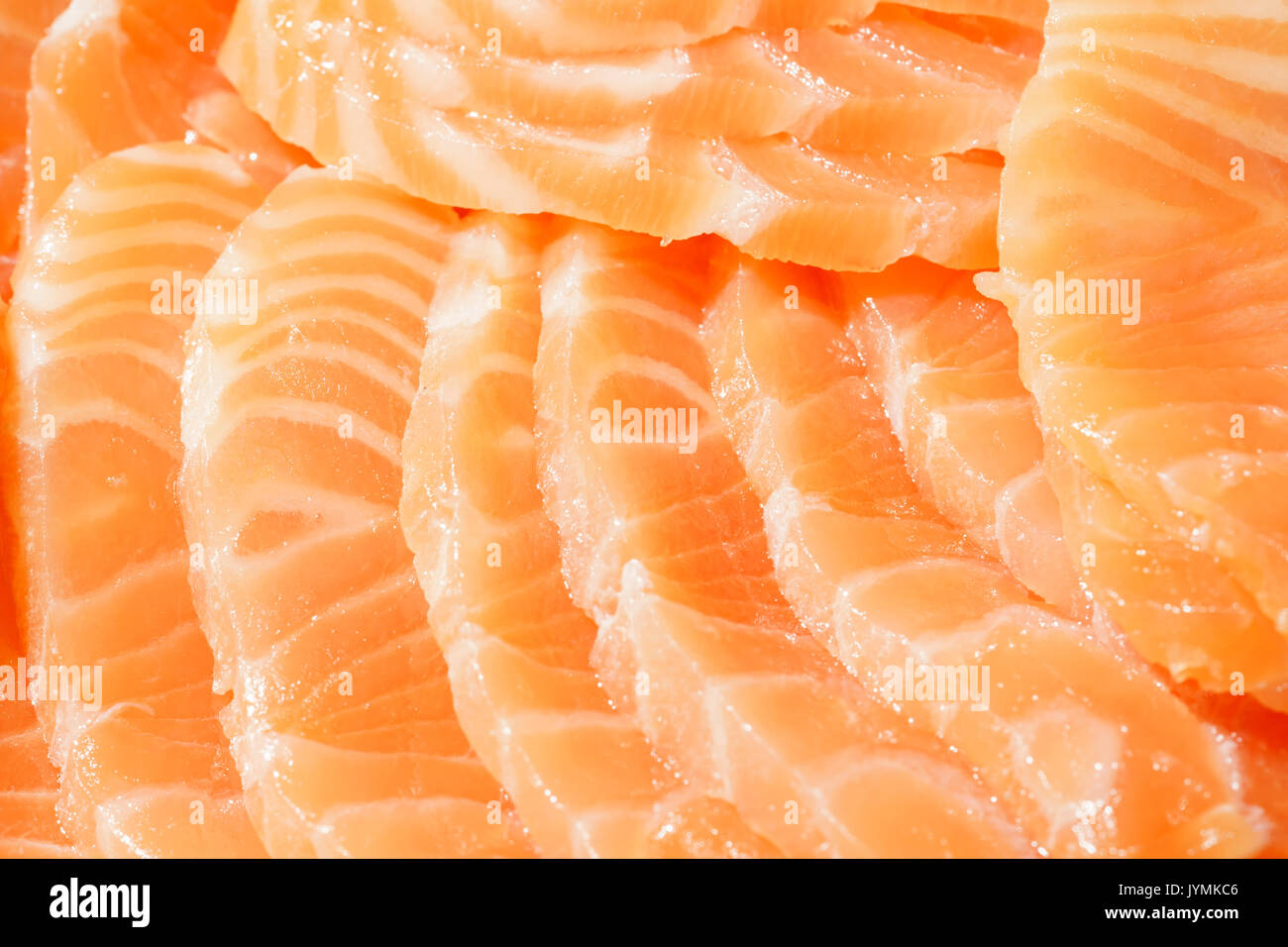 Hintergrund auf Scheiben Lachssteak roten Fisch. Stockfoto