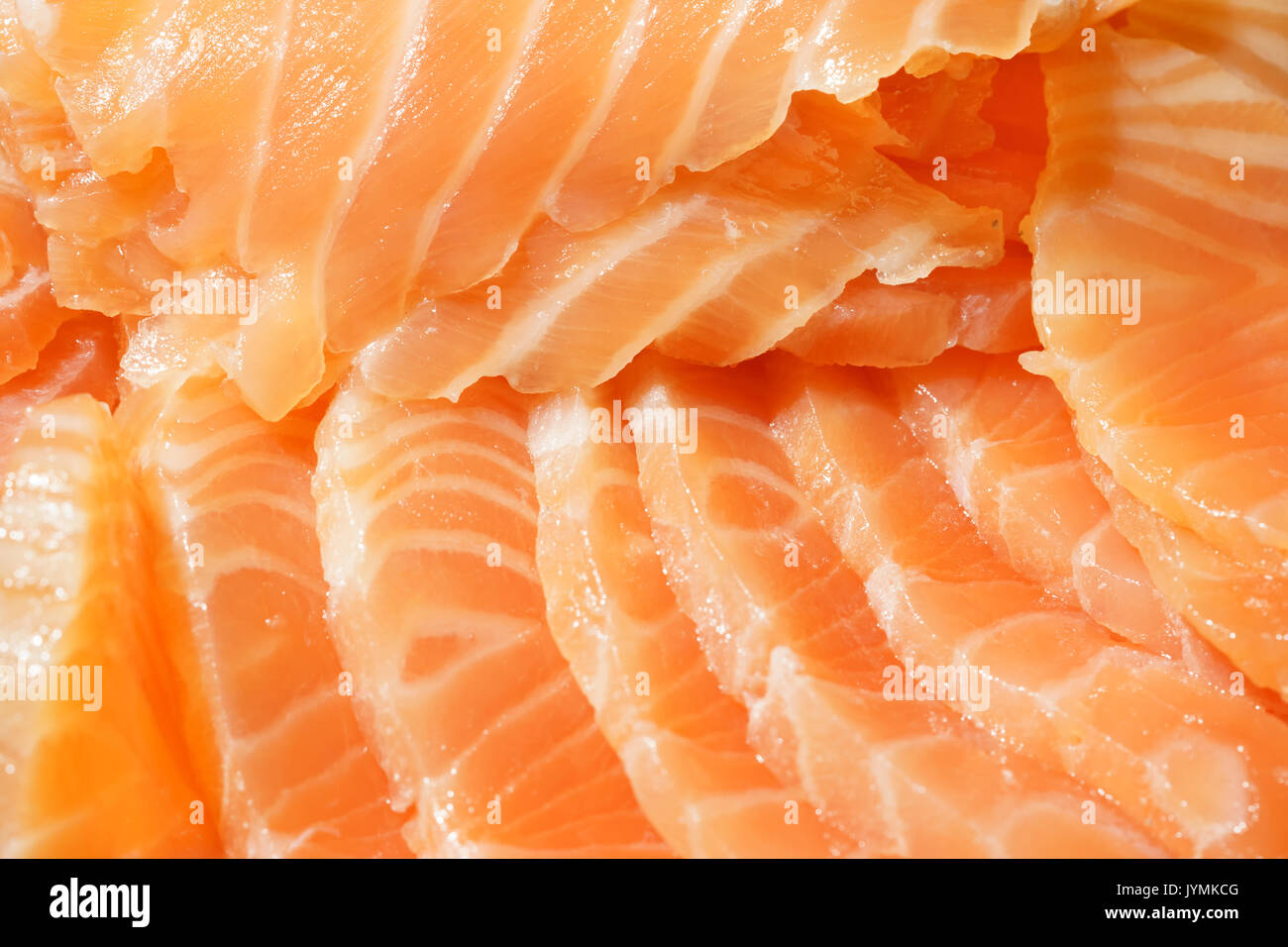 Hintergrund auf Scheiben Lachssteak roten Fisch. Stockfoto