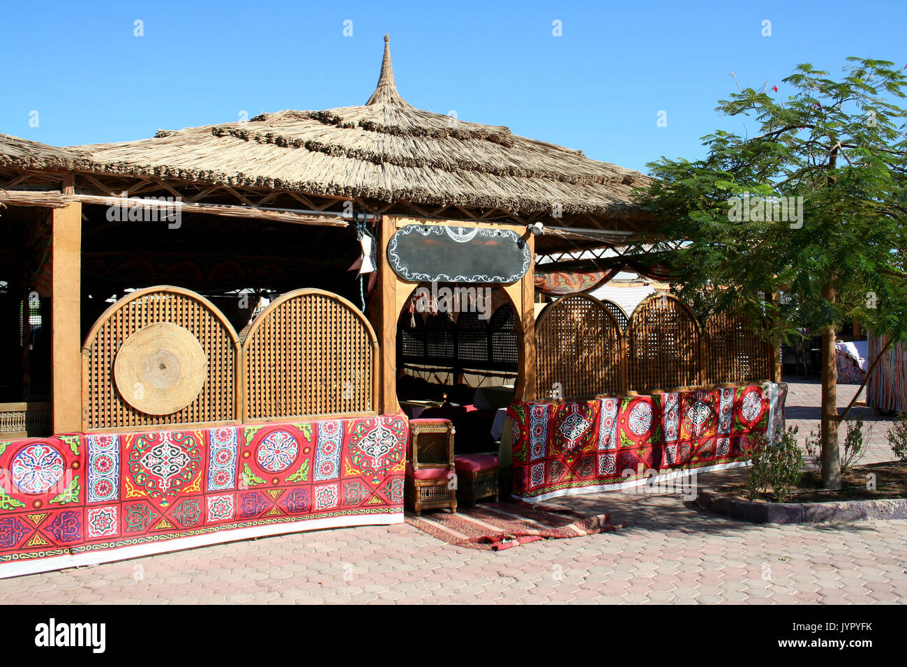 Lodges, die sich erholend Touristen Stockfoto