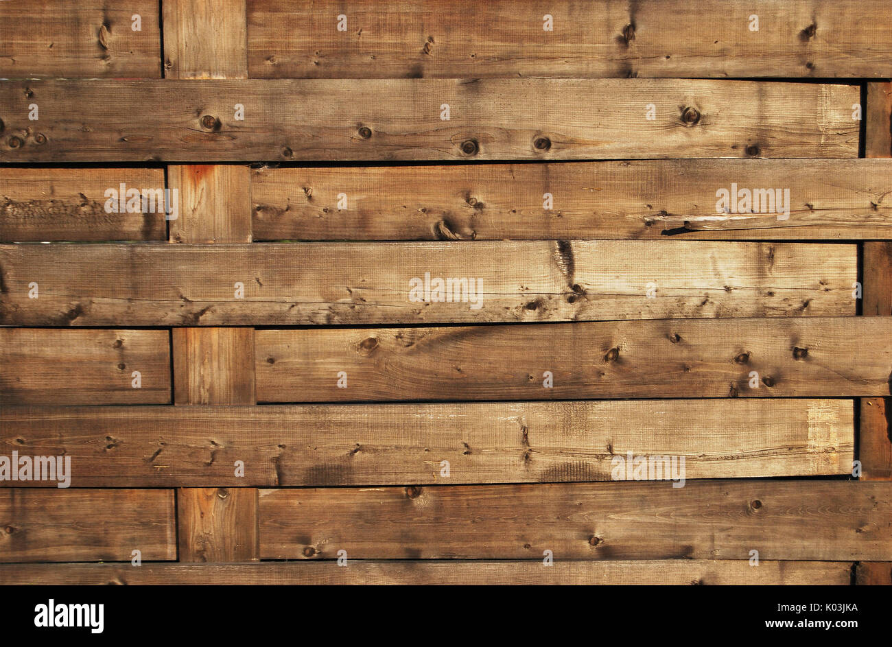 Die Textur einer Holz- Wicker Zaun der horizontalen Ausrichtung Stockfoto