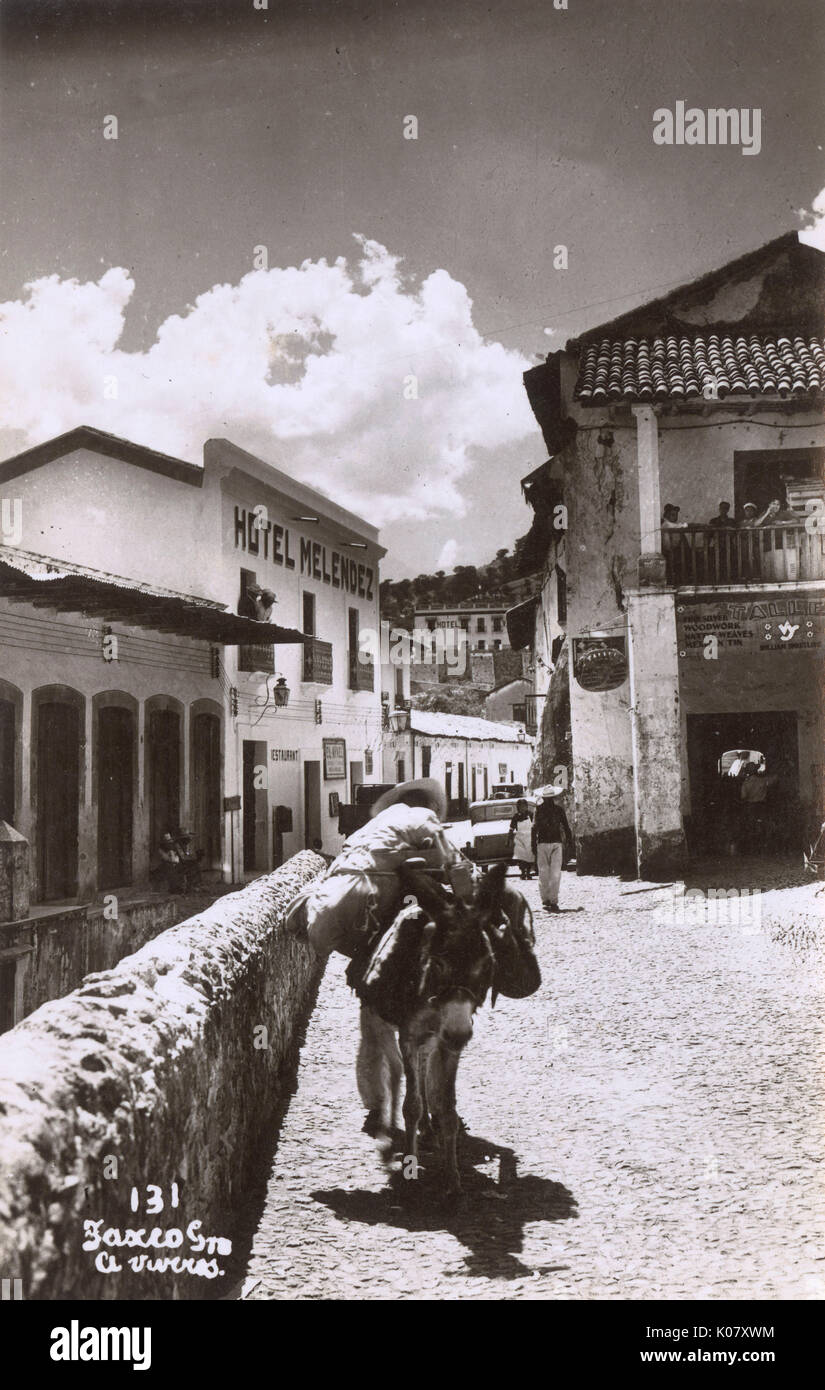 Taxco, Mexiko - pack Maultier und Hotel melendez Datum: ca. 1940 Stockfoto