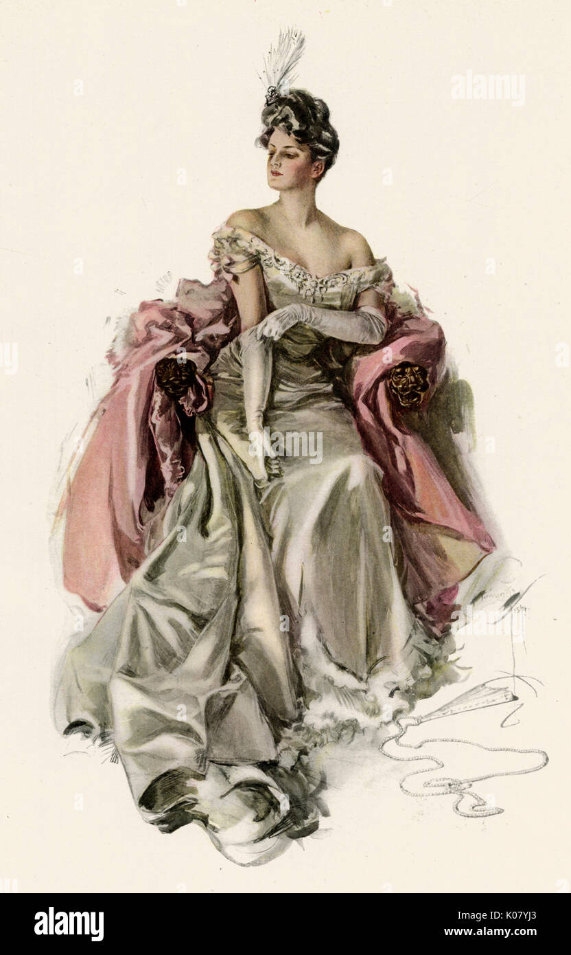 Frau trägt einen eleganten weißen aus Schulter Abend Kleid mit weißen lange Handschuhe. Datum: 1907 Stockfoto