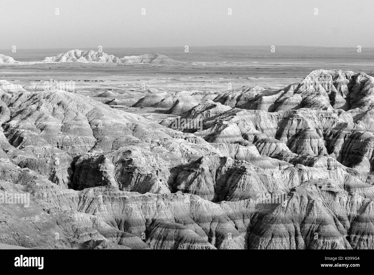 Die Wolken lassen die Sonne Licht Felsformationen in der South Dakota Badlands Stockfoto