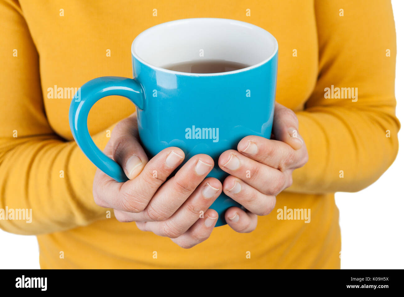 Weibliche Hände halten eine große Tasse Kaffee closeup mit Kopie Raum Stockfoto