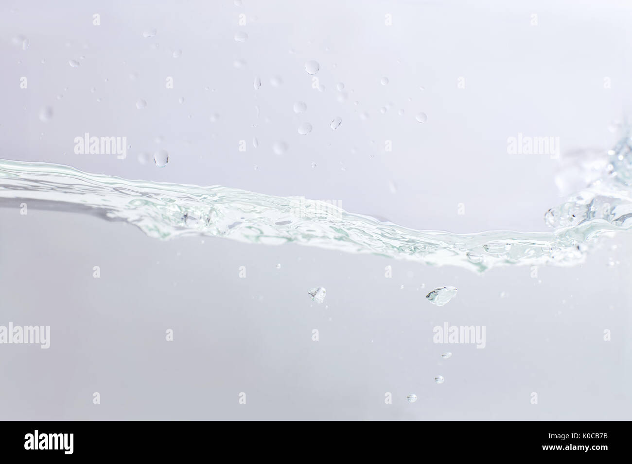 Blue Wave und Blasen für sauberes Wasser. Stockfoto