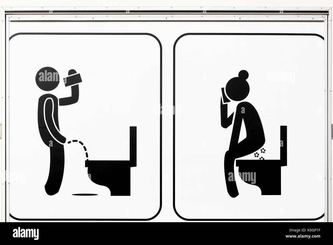Zeichen der Toiletten für Männer und Frauen Stockfoto