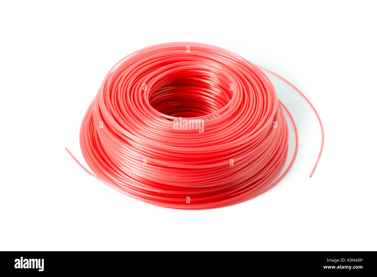 Ein Schieber der roten Austausch trimmer Line für ein Unkraut Esser. Stockfoto