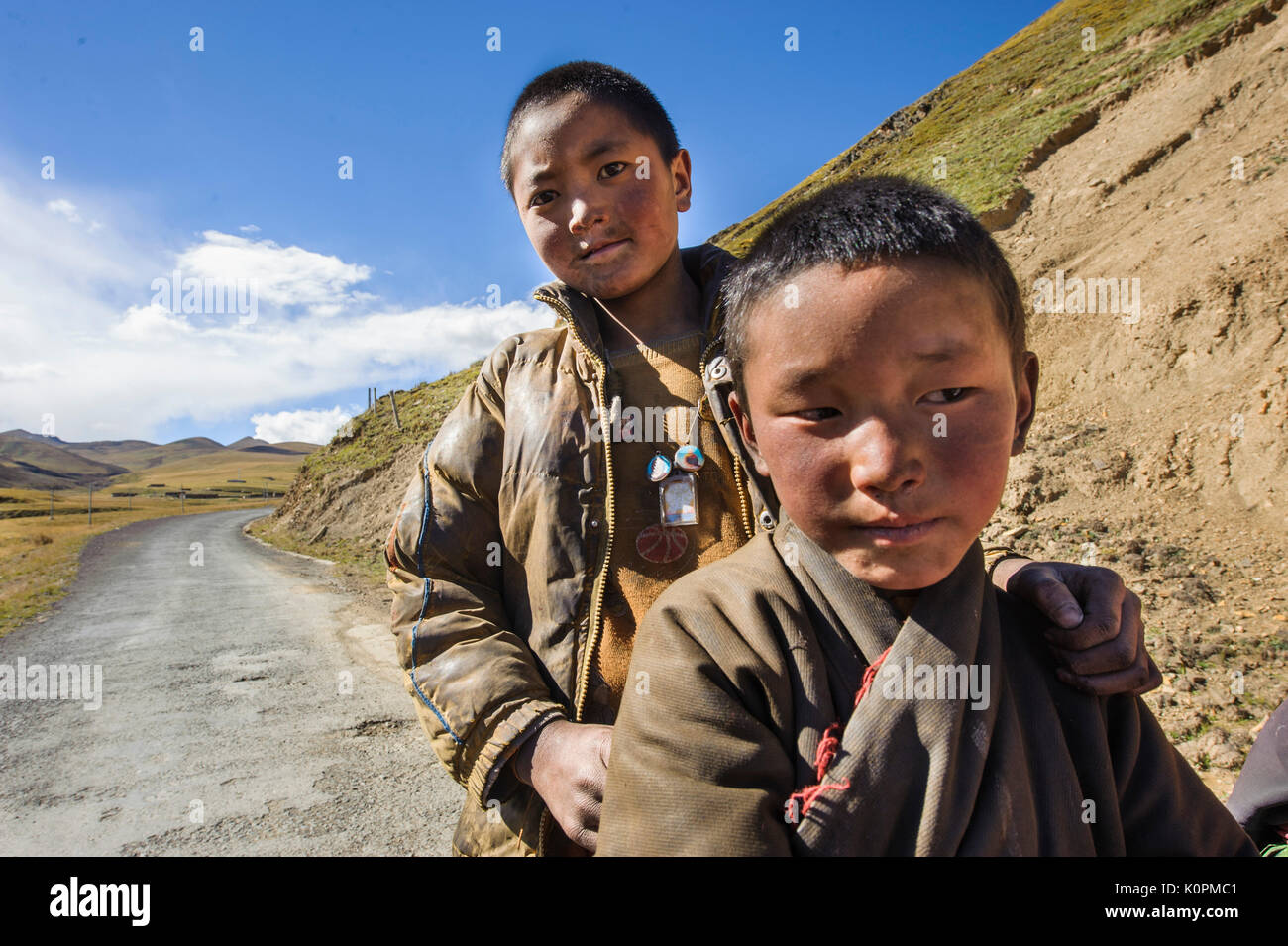 Frühe Spuren der Rauheit auf dem Gesicht von Nomad tibetische Kinder. Kham in der Provinz Stockfoto