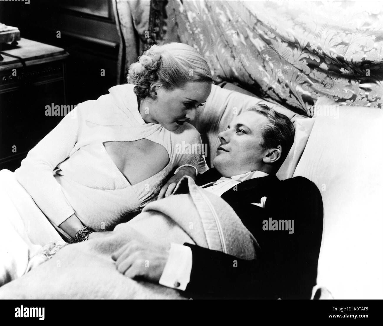 BETTE DAVIS, GENE RAYMOND, ex-Frau, 1933 Stockfoto