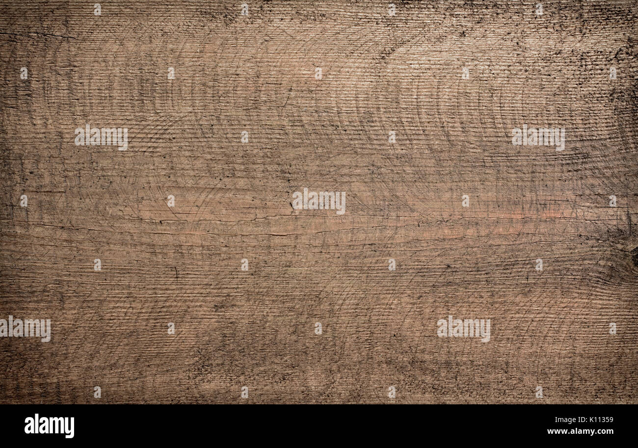 Braun dunkel zerkratzt aus Holz schneiden, Schneidebrett. Holzstruktur. Stockfoto