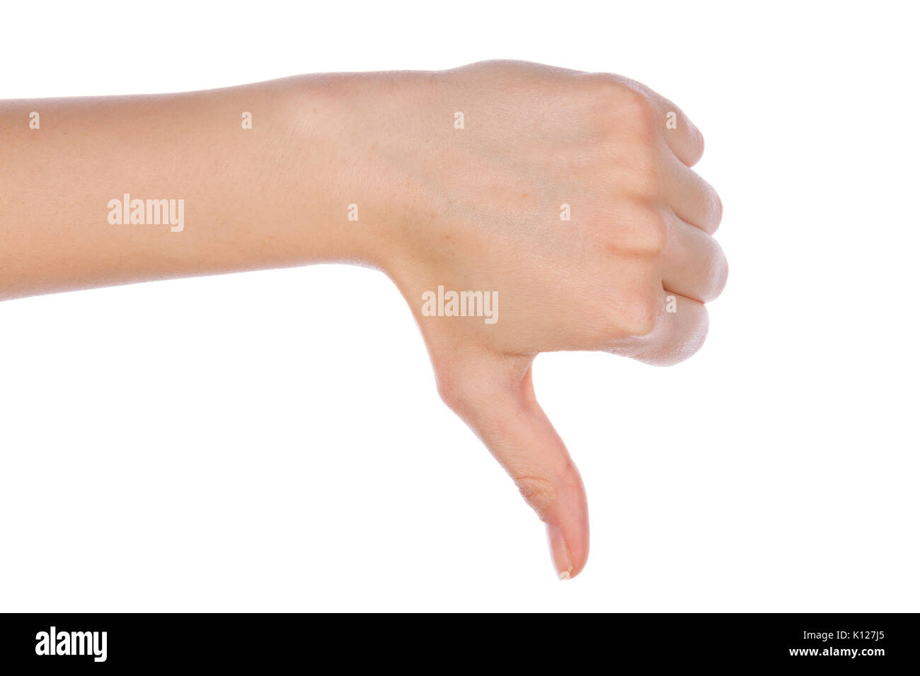 Mädchen Hand, Daumen nach unten Ausfall Handzeichen Geste. Gesten und Zeichen. Körpersprache auf weißem Hintergrund. Stockfoto