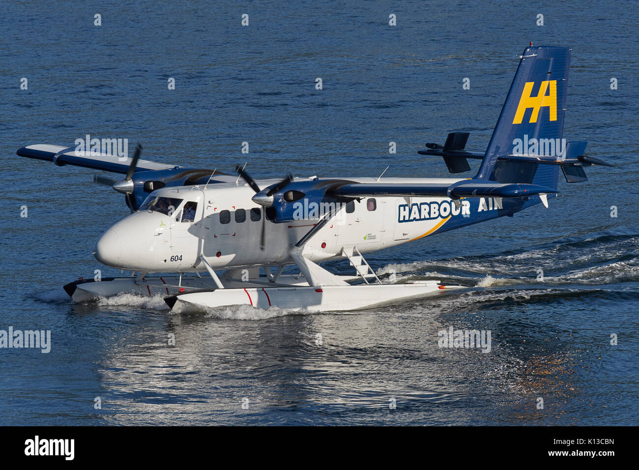 Harbour Air Wasserflugzeuge de Havilland Canada Twin Otter Wasserflugzeug, über den Hafen von Vancouver das Rollen auf den Vancouver Hafen Flight Centre, Kanada Stockfoto