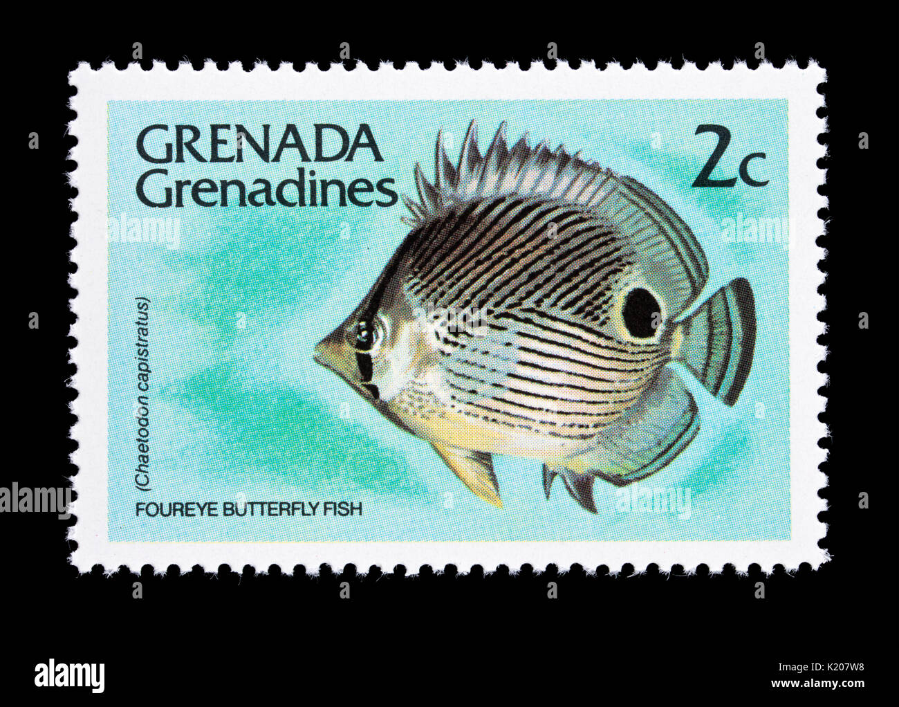 Briefmarke von Grenada Grenadinen Darstellung einer foureye Falterfische (Chaetodon capistratus) Stockfoto