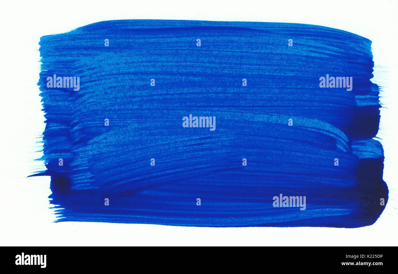 Ein Klecks blaue Farbe auf einem weißen Papier. Künstlerische Element. Stockfoto