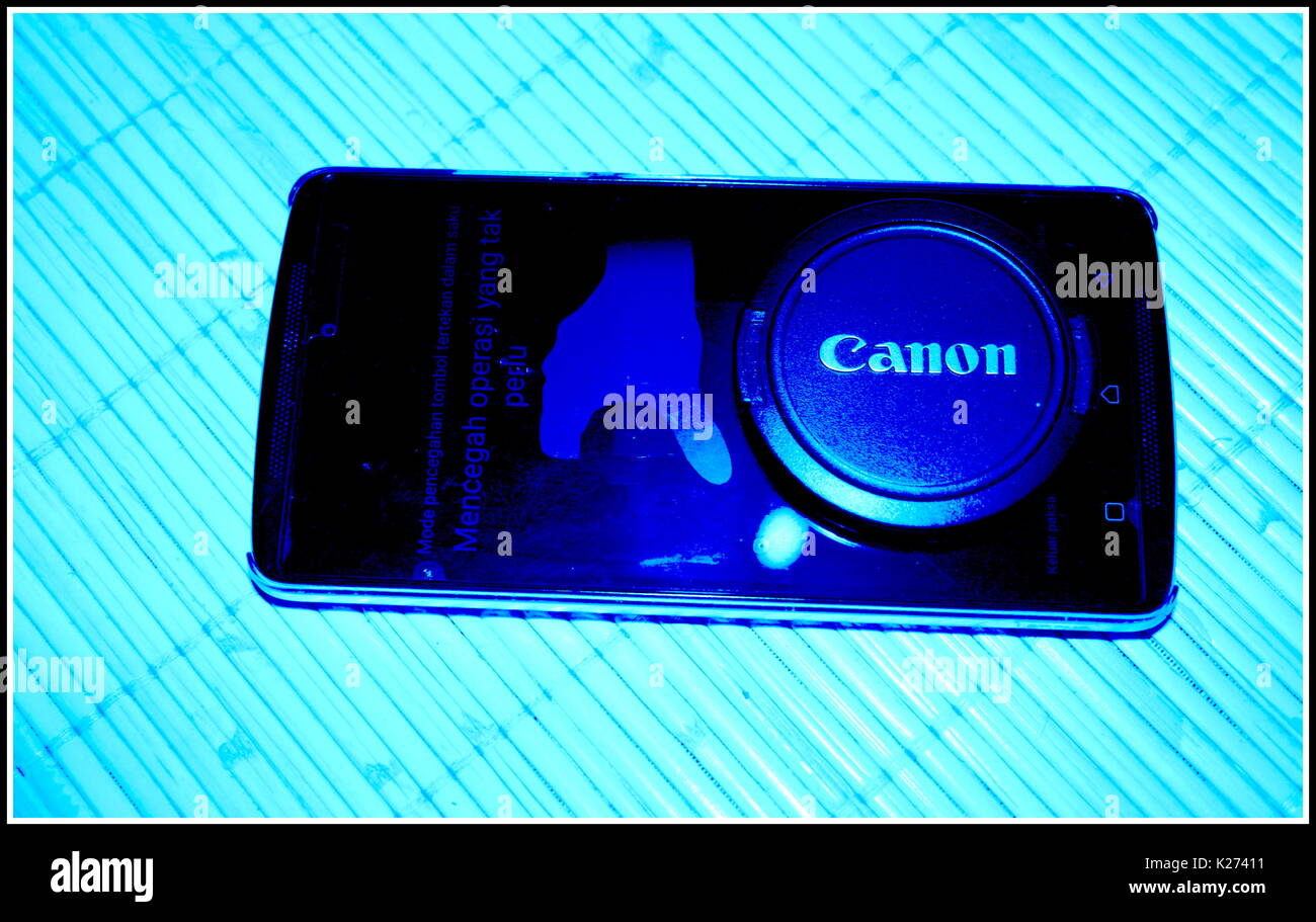 Handphone und SC Canon Stockfoto