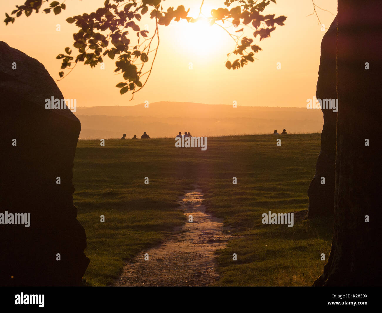 Gerade die Sonne bei Heaven's Gate, longleat, Wiltshire, am Ende eines heißen August Bank Holiday Stockfoto