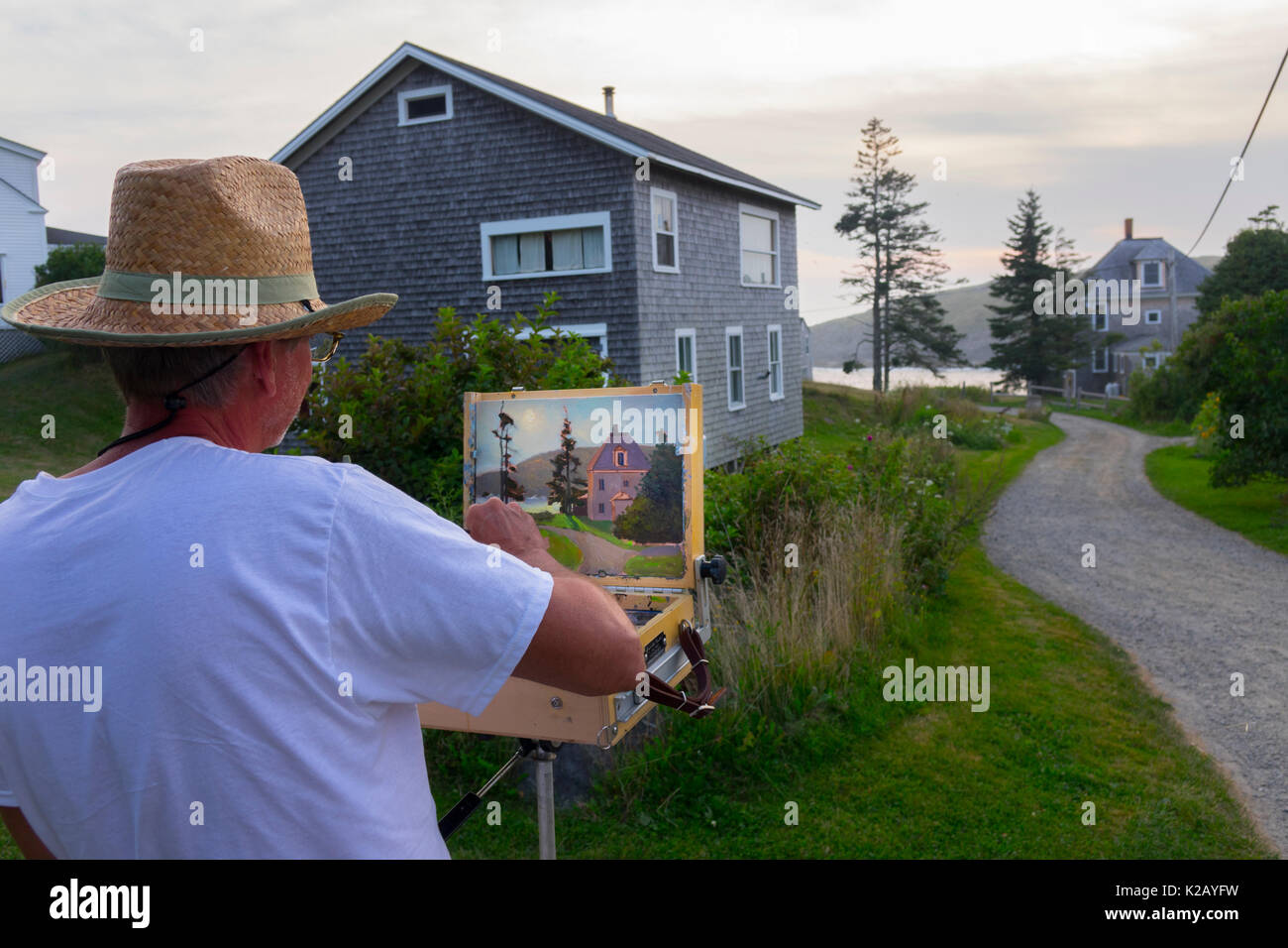 USA Maine ICH Monhegan Island ein Künstler ist Malen ein Haus ein Kiesweg am Ende des Tages Stockfoto