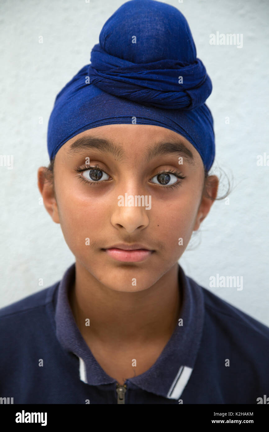 Porträt von einem Sikh Punjabi jungen Kerl Kind in Hongkong Stockfoto