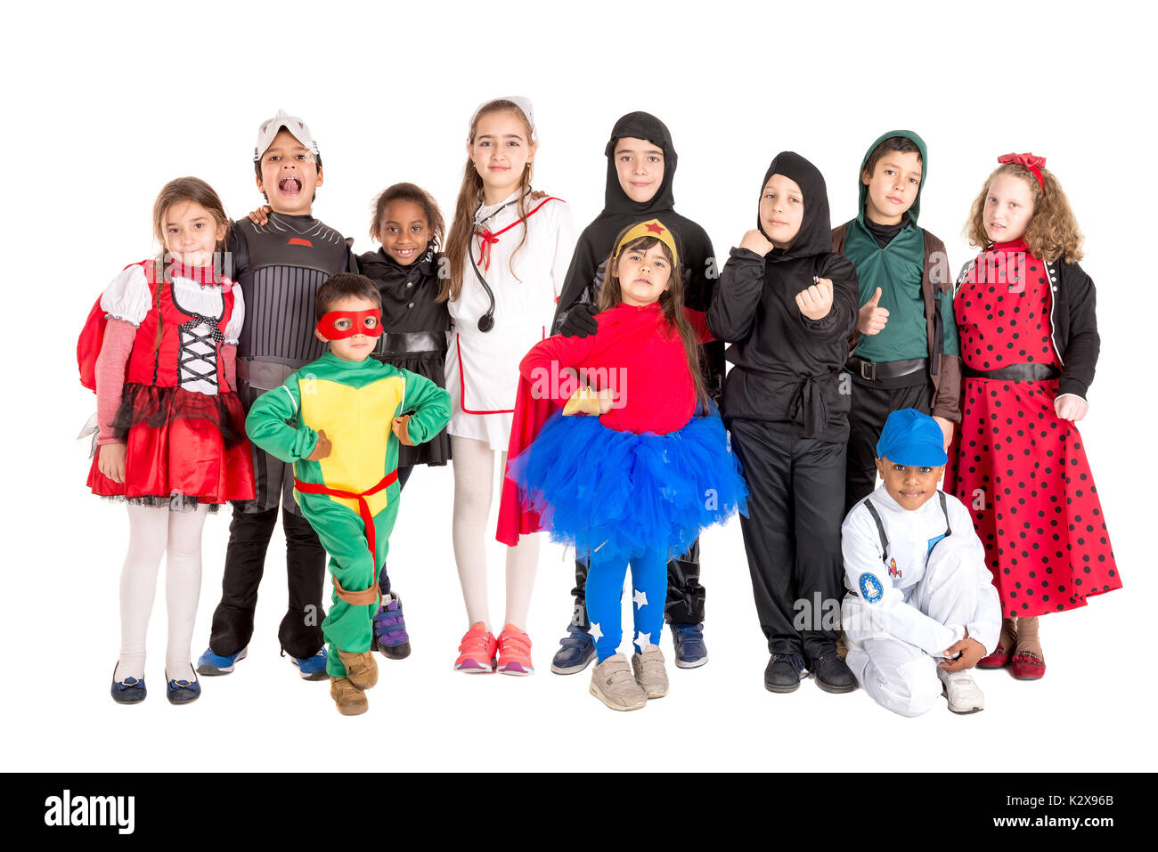 Gruppe von Kindern im Halloween/Canaval Kostüme isoliert Stockfoto