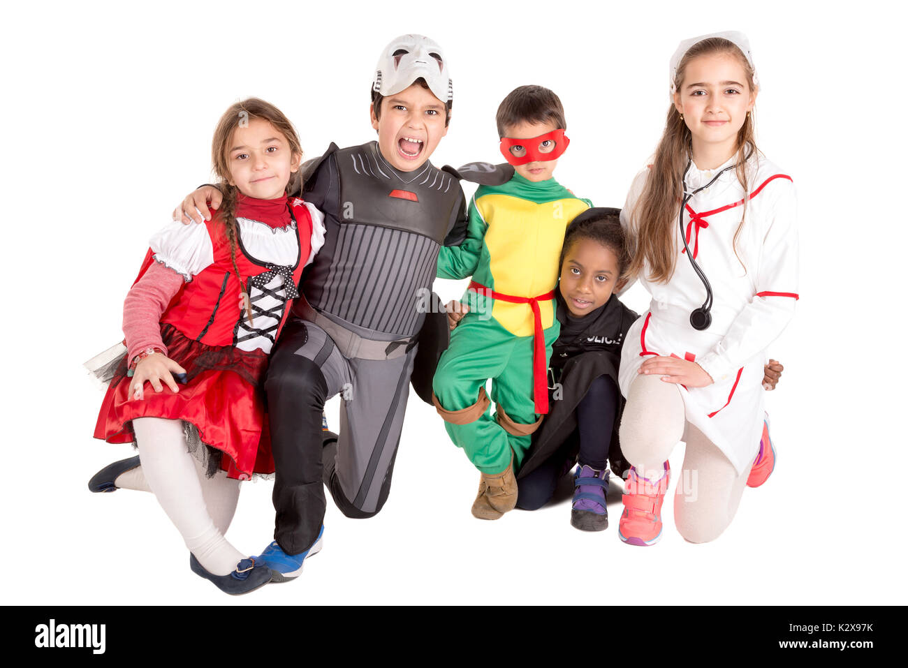 Gruppe von Kindern im Halloween/Canaval Kostüme isoliert Stockfoto