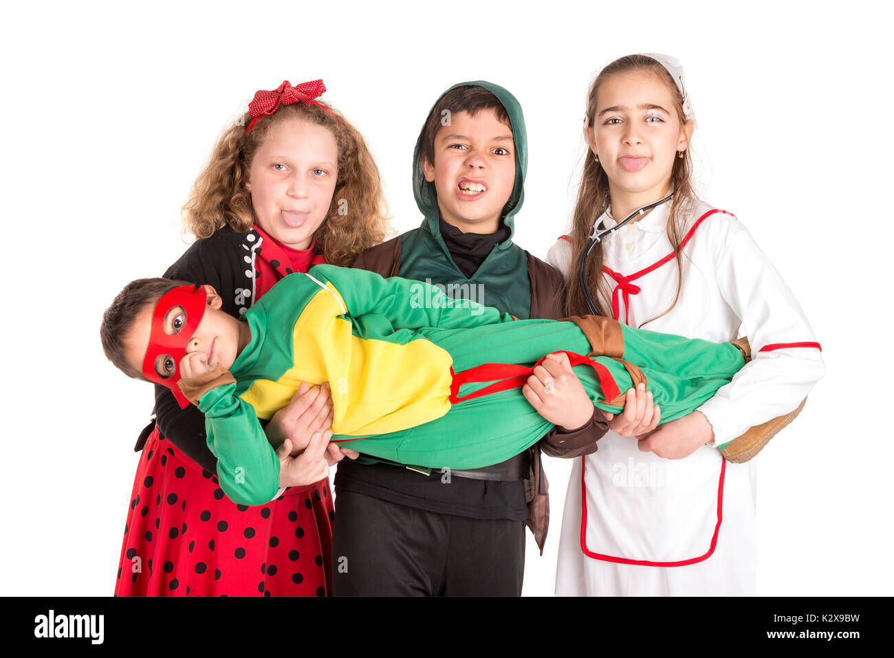 Gruppe von Kindern im Halloween/Canaval Kostüme isoliert Stockfoto