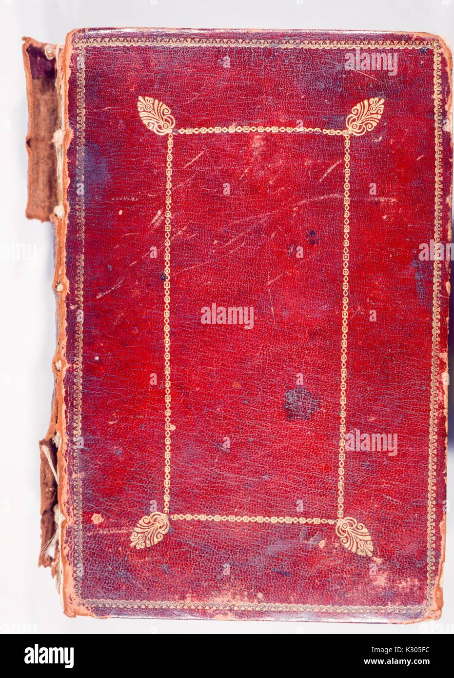 Abdeckung der bilderhandschrift, rot Leder mit gold Detaillierung, Bindung leicht Schälen, 2013. Stockfoto