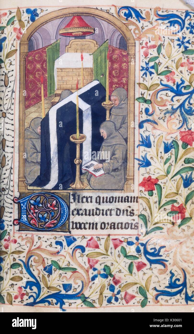 Bilderhandschrift Seite von "Initium sancti euangelii secundum iohannem: Gloria tibi Domine' mit Illustrationen mit Menschen beten mit Schmuckrahmen, Buch der Stunden Manuskript in Lateinamerika im 15. Jahrhundert gedruckt, 1400. Stockfoto