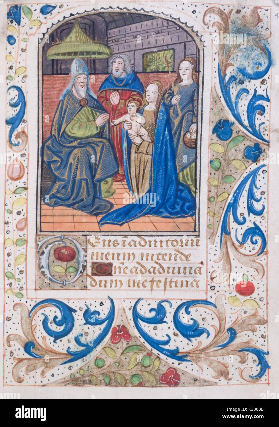 Bilderhandschrift Seite von 'Ténéré et credere mich faciat' mit der Abbildung eines Babys mit vier Erwachsene mit einem dekorativen Rand, Buch der Stunden Manuskript in Lateinamerika im 15. Jahrhundert gedruckt, 1400. Stockfoto