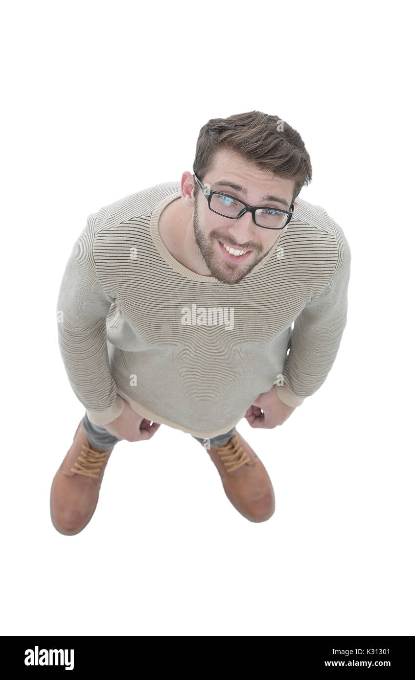 Blick von oben. Ernsthafte junge Mann an der Kamera schaut. Stockfoto