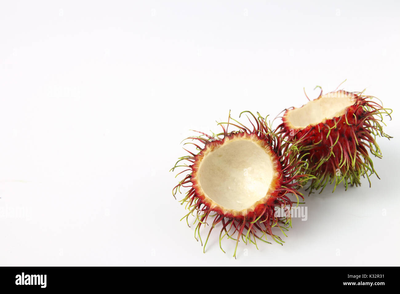 Rambutan auf dem weißen Hintergrund isoliert. Stockfoto