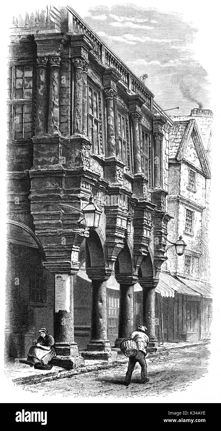 1870: Einwohner in der Nähe der Guildhall, die mittelalterlichen Grundlagen und ist behauptet worden, die älteste städtische Gebäude in England noch zu sein. Die jetzige Halle wurde im Jahre 1330 erbaut und der Portikus über das Pflaster von Exeter High Street ist ELISABETHANISCHEN (1592-5). Ein großer Teil der Bausubstanz ist mittelalterliche, obwohl die kunstvolle Fassade in der 1590 s und der Innenraum weitgehend im 19. Jahrhundert restauriert wurde, Exeter, Devon, England hinzugefügt wurde. Stockfoto