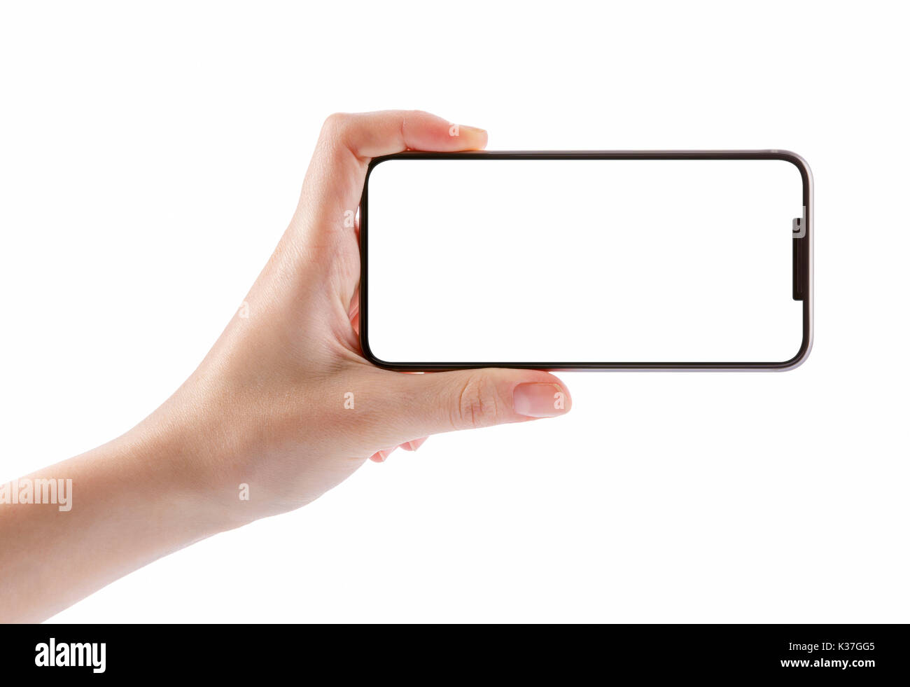 Junge Mädchen Hand schwarz smart phone auf weißem Freistellungspfad innerhalb von isolierten Stockfoto