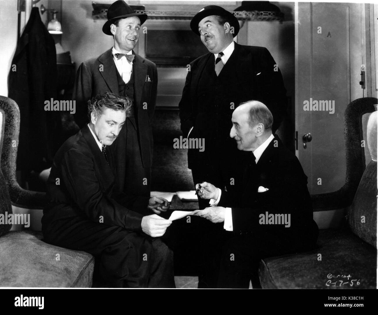 20. L-R, John Barrymore, ROSCOE KARAS, WALTER CONNOLLY, ETIENNE GIRADOT Stockfoto