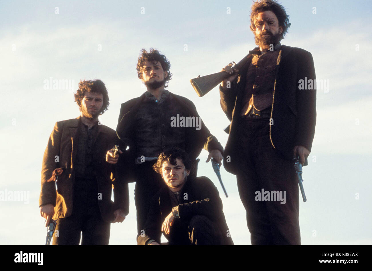 NED KELLY ORLANDO BLOOM, Mitte, Heath Ledger, rechts Datum: 2003 Stockfoto