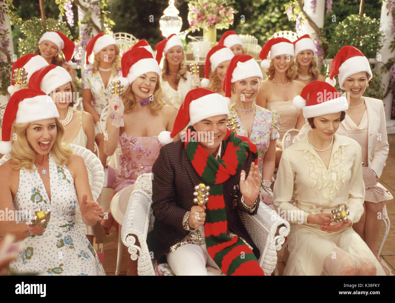 Die Stepford Wives vordere Reihe l und r, Faith Hill, Roger BART und Nicole Kidman Regie: Frank Oz betrifft: Weihnachten, SANTA HÜTE FILM VON Dreamworks SKG Datum: 2004 Stockfoto