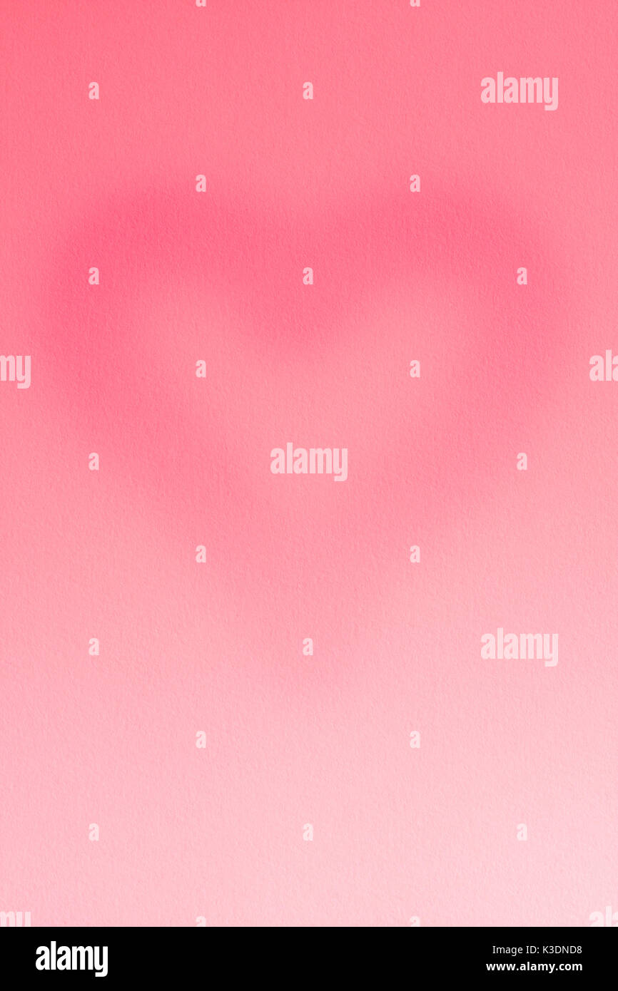 Tag Valentinstag. aquarell papier Textur mit der Form des Herzens oder Hintergrund für Kunstwerke leicht rosa Farbe. Stockfoto