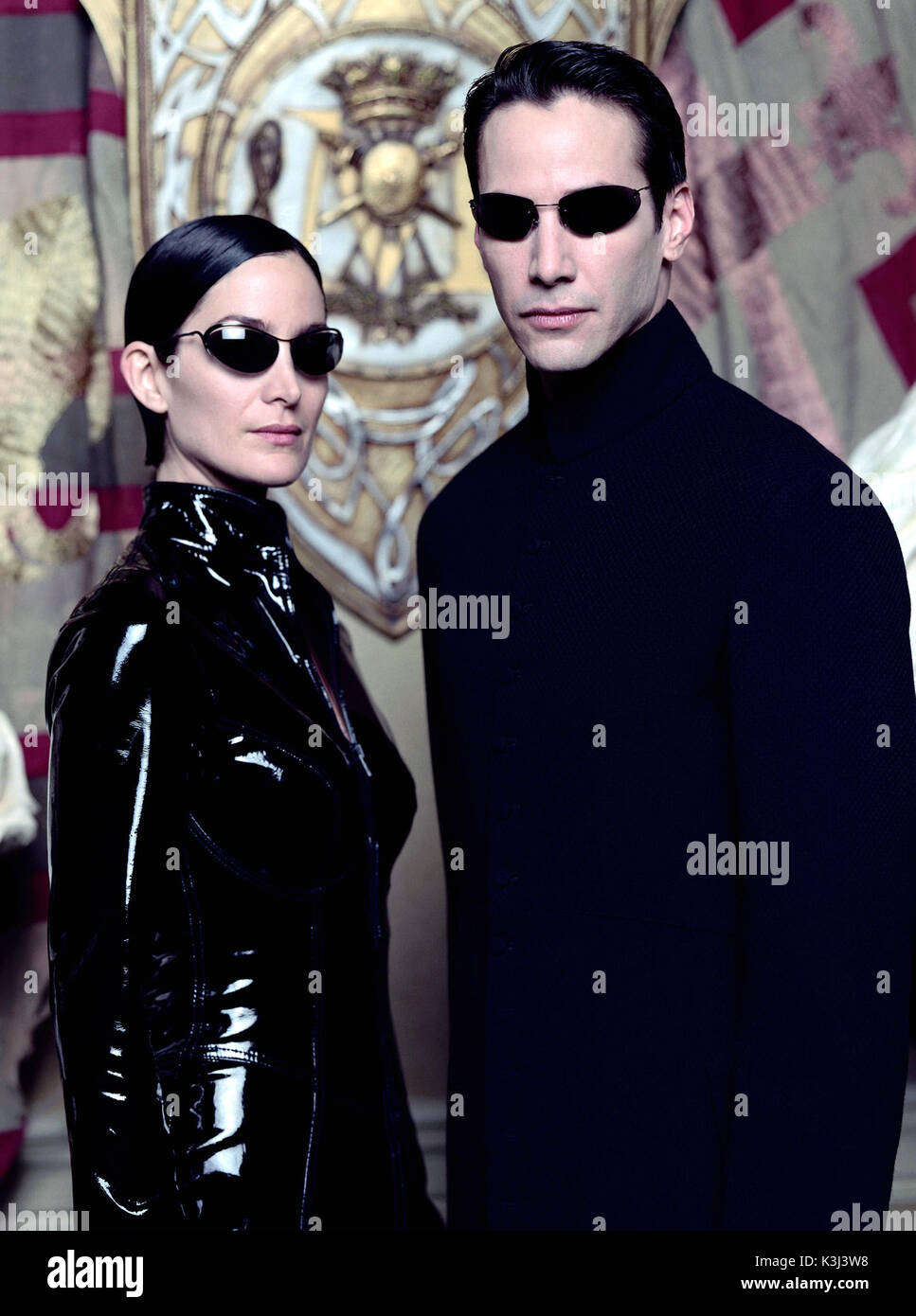 Die MATRIX RELOADED CARRIE-ANNE MOSS als Dreifaltigkeit, Keanu Reeves als Neo Stockfoto