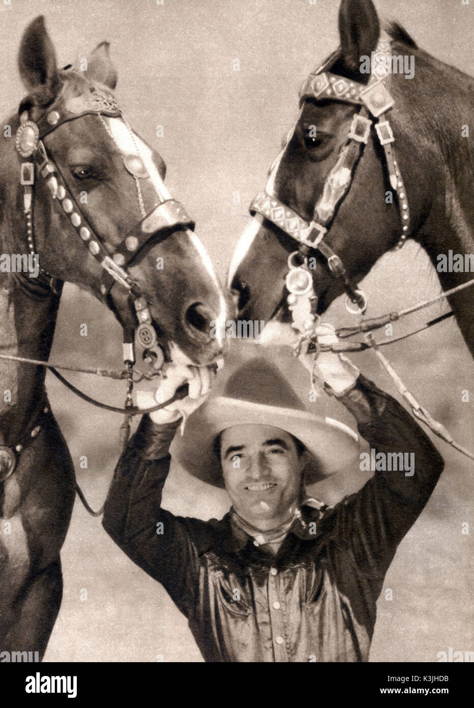 Cowboy star TOM MIX mit seinem ursprünglichen Pferd Tony Stockfoto