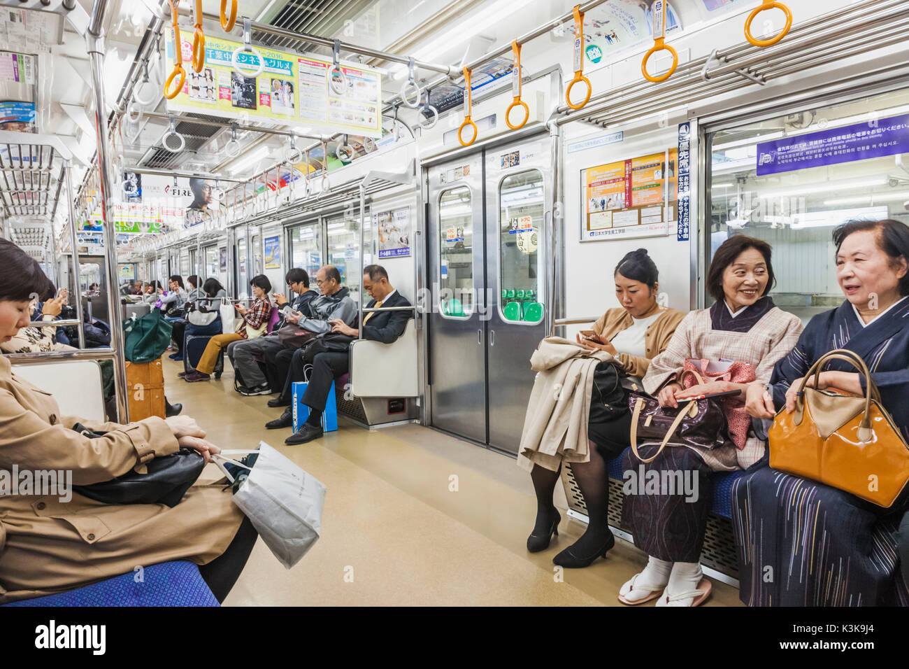 Japan, Hoshu, Tokio, Bahnreisende Stockfoto