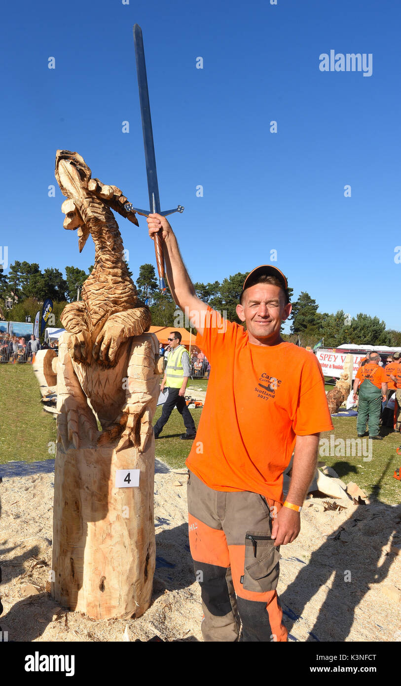 Des Ubdravis & seine Gewinner bei den Schottischen Chainsaw Carving Wettbewerb, gehalten am Samstag 2.September an der Patrone, Inverness-shire. Stockfoto