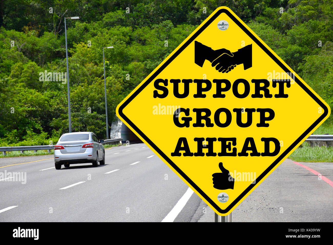 Support Gruppe Vor gelb Warnung Schild Stockfoto