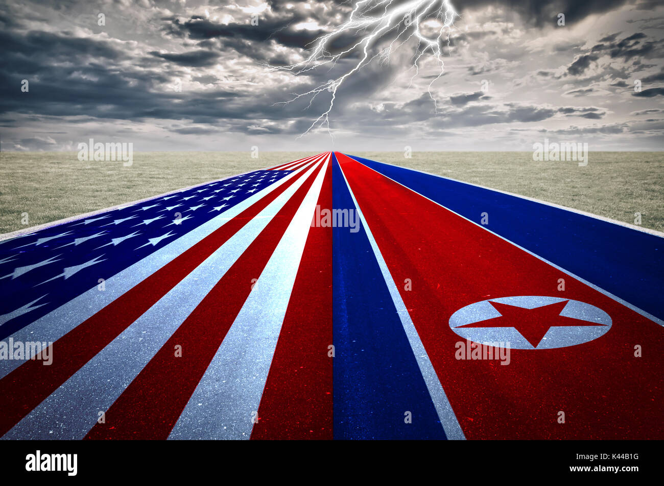 Flagge der USA und Nordkorea auf der Straße, Sturm Hintergrund. Konzept der Konflikt zwischen zwei Nationen, Washington und Pjöngjang. Stockfoto