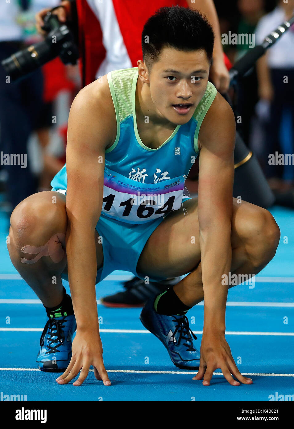(170905) - Tianjin, Sept. 5, 2017 (Xinhua) - Xie Zhenye der Zhejiang reagiert, nachdem die Männer 200 m-Finale bei den 13 chinesischen Nationalen Spiele in North China Tianjin Gemeinde, Sept. 5, 2017. Xie Zhenye gewann die Goldmedaille mit 20,20 Sekunden. (Xinhua / Wang Lili) Stockfoto