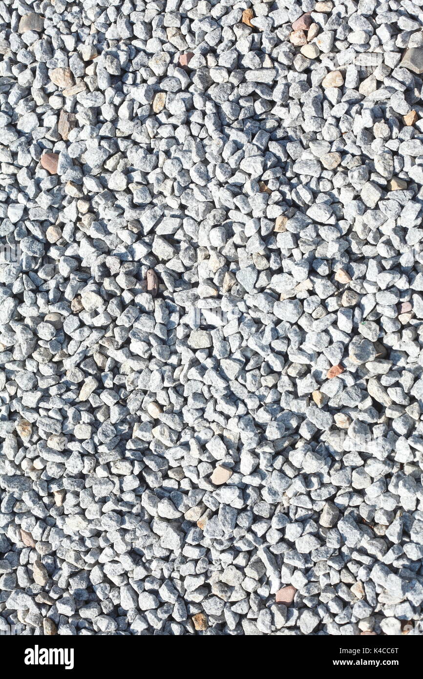 Grau wenig grit Steine als Bodenbelag Stockfoto