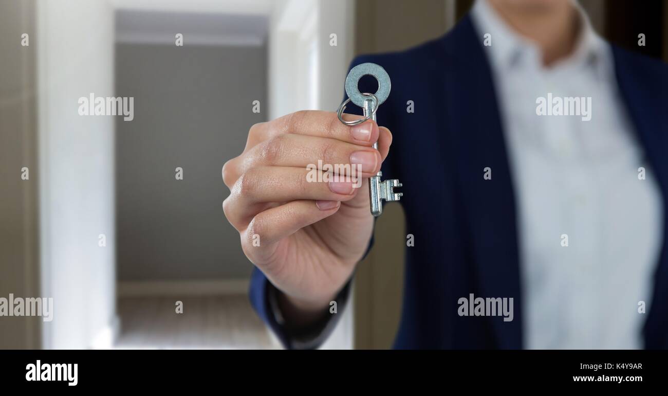 Digital composite einer Hand, die Taste Home Stockfoto